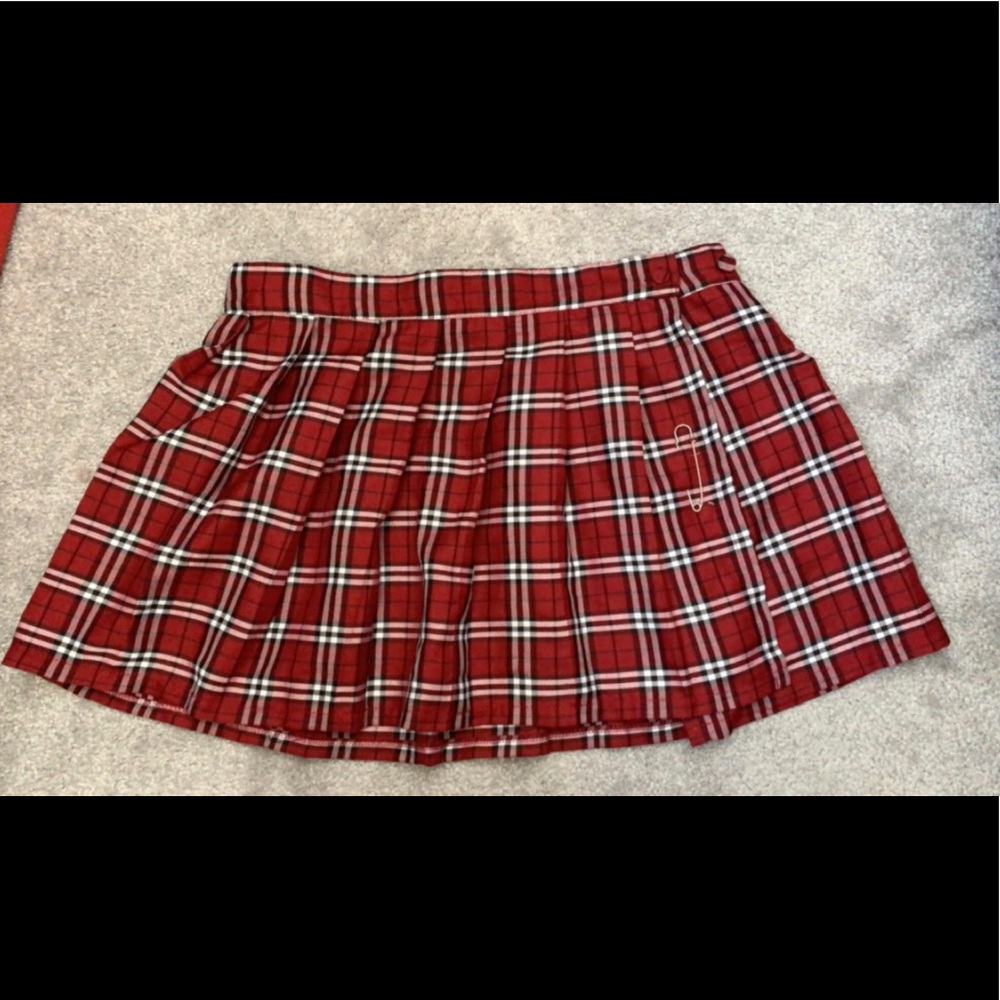 Red plaid skirt with pin